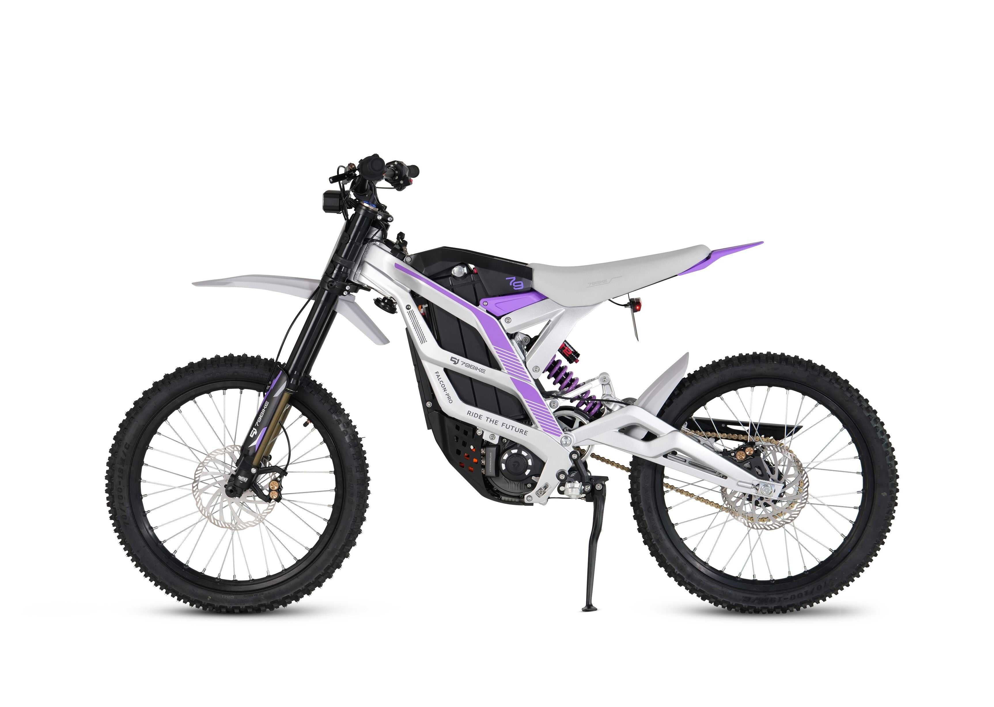 79 Bike Falcon Pro electric dirt bike crossing a dry riverbed with excellent traction and maneuverability