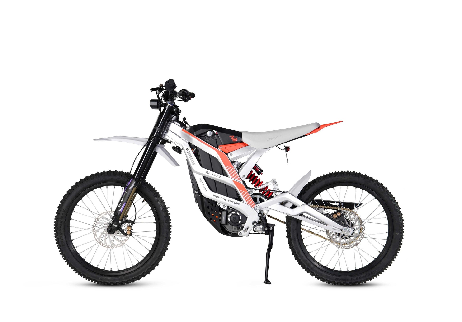 Front view of 79 Bike Falcon Pro approaching a steep climb with inverted fork suspension compressed for impact