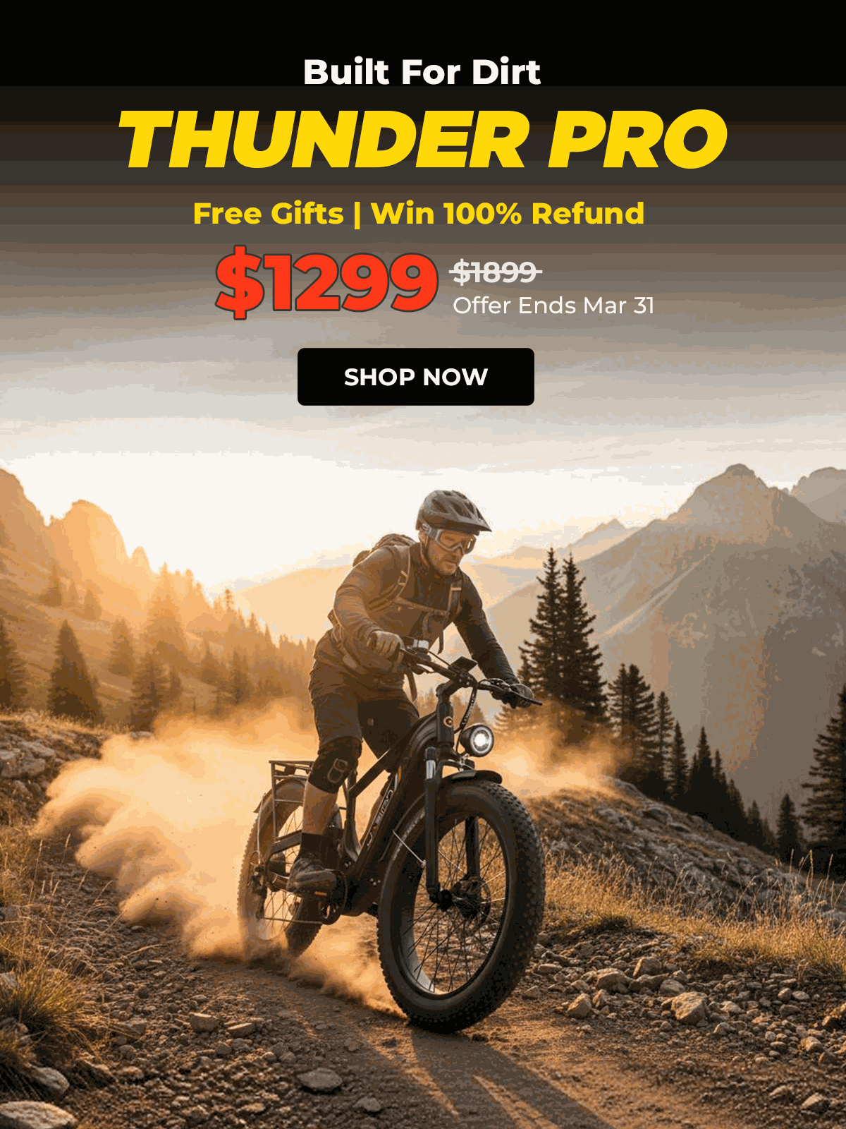 Jasion Patrol 52 electric dirt bike in black with fat tires and LED headlight riding on rocky mountain trail