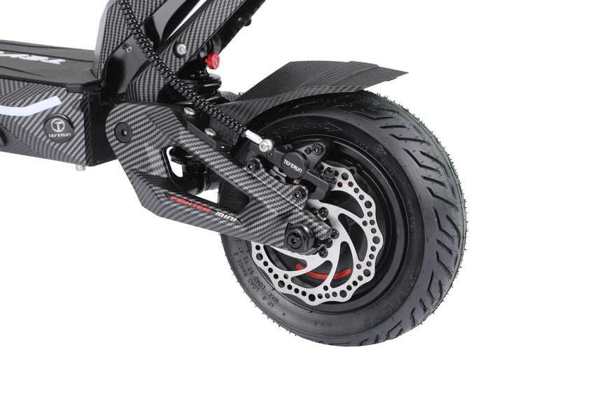 Rear wheel of a black carbon fiber electric scooter Teverun Fighter Mini Pro 2.0 with hydraulic disc brake and tubeless pneumatic tire