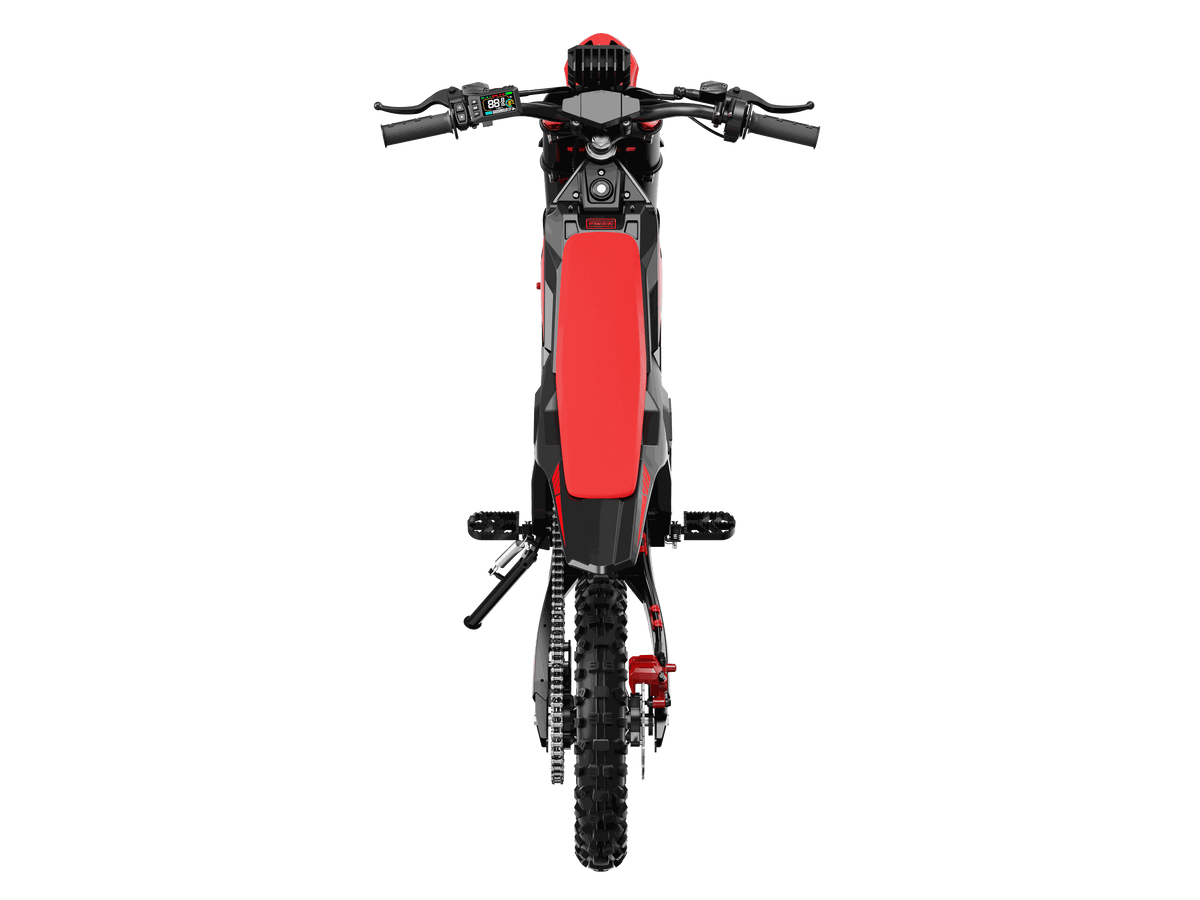 Yozma IN 10 Pro Electric Dirt Bike with red and black body, knobby off-road tires, LCD display, and hydraulic disc brakes